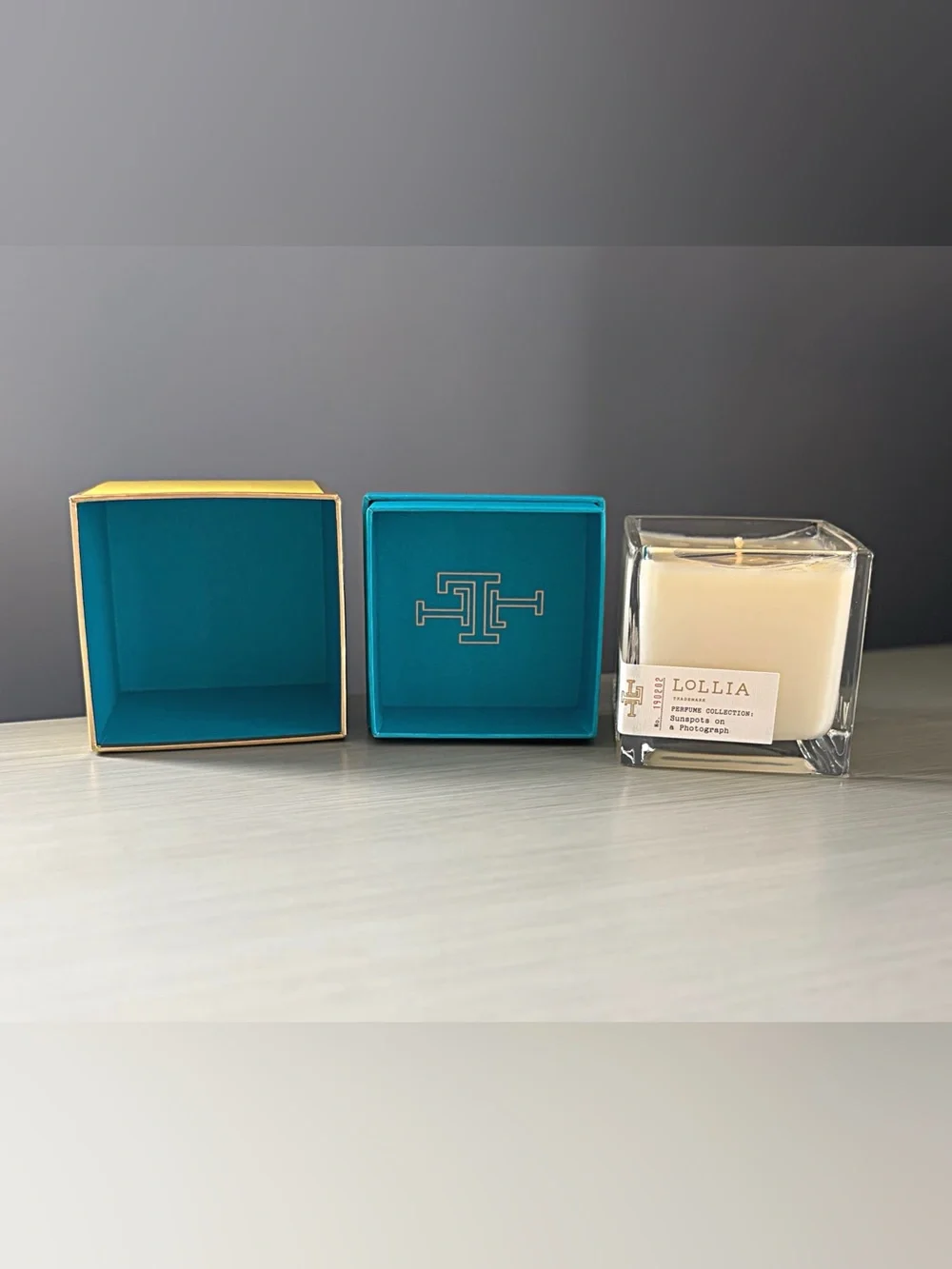 LOLLIA Poetic License Candle Margot Elena 02 Sunspots On Photograph DISCONTINUED